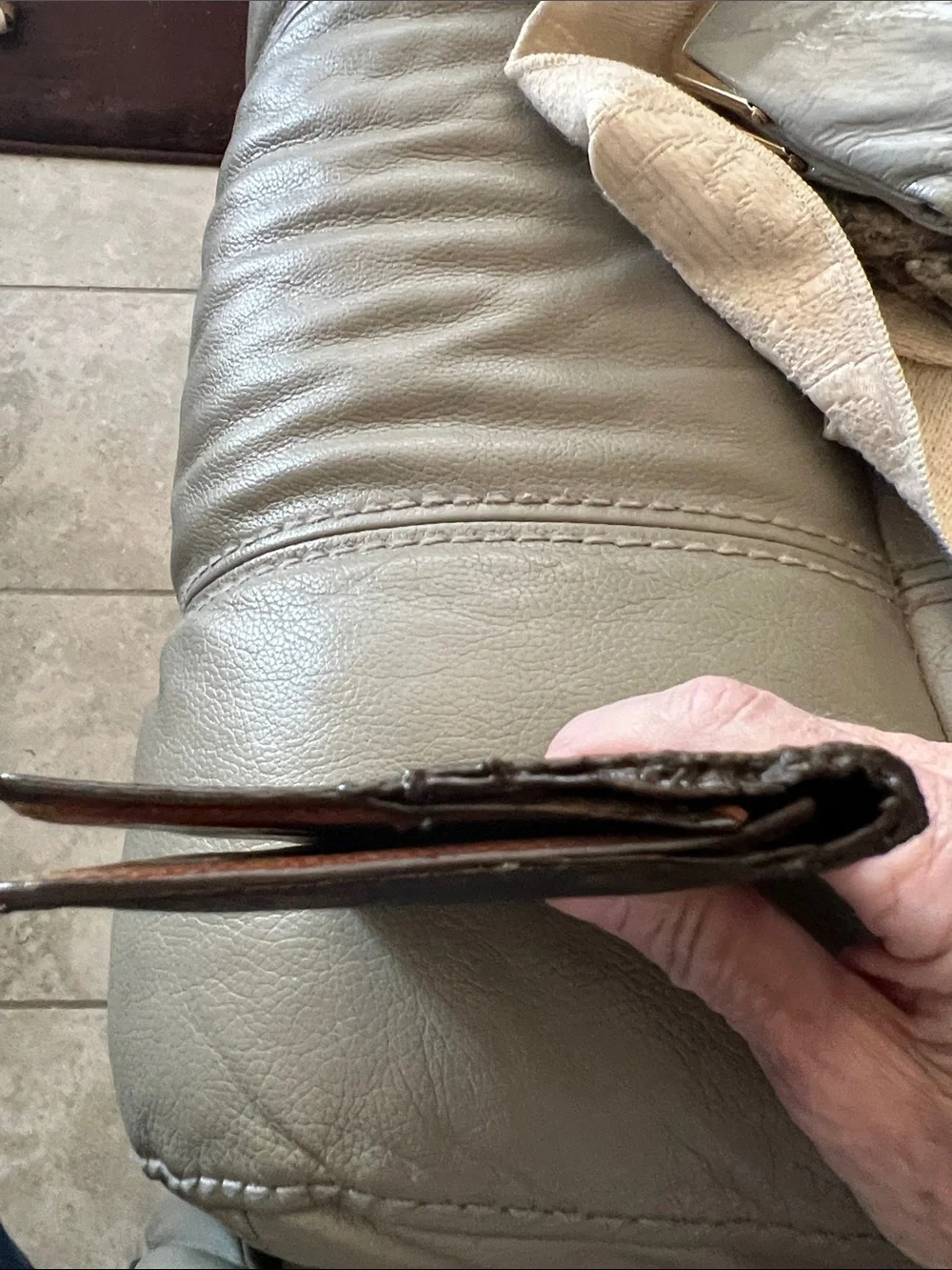 Louis Vuitton Monogram bifold wallet in Brown and Tan